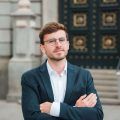 portrait-confident-young-businessman-with-his-arms-crossed-1-scaled.jpg